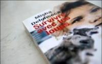 7722113123_la-couverture-du-livre-de-misha-defonseca-survivre-avec-les-loups